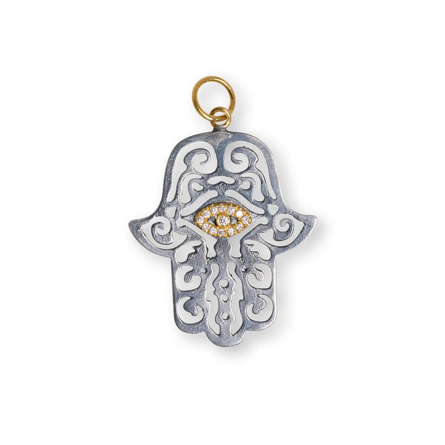 Silver Hamsa pendant with gold accents on a white background