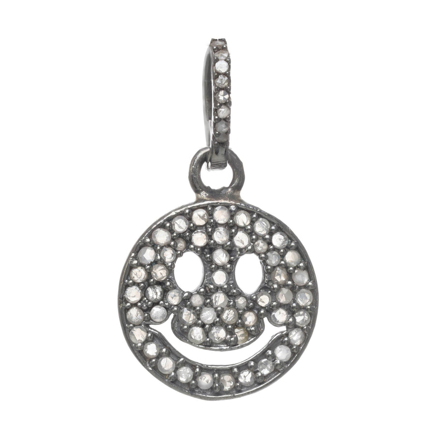 Silver smiley face pendant with embedded stones on a white background