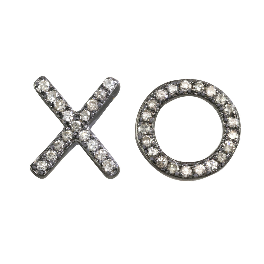Earrings shaped like 'XO' with gemstones on a white background