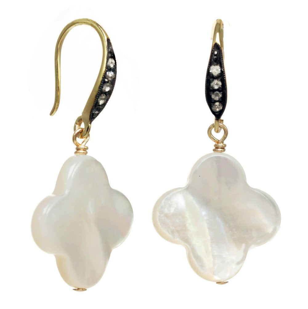 Pair of pearl earrings with gold and black accents on a white background