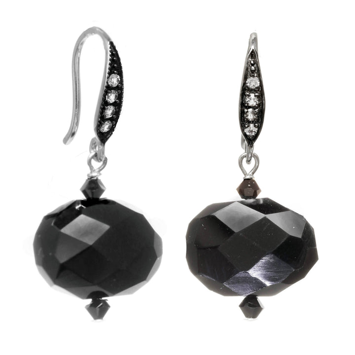 Pair of black faceted bead earrings on a white background