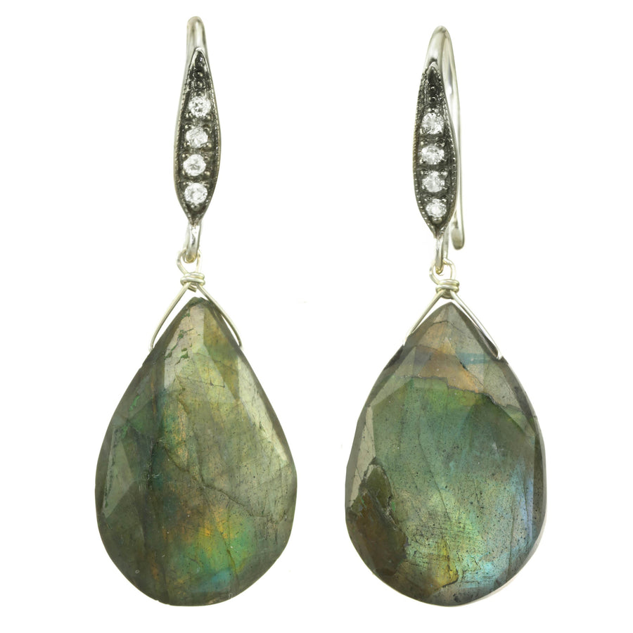 Teardrop-shaped labradorite earrings with diamond accents on a white background