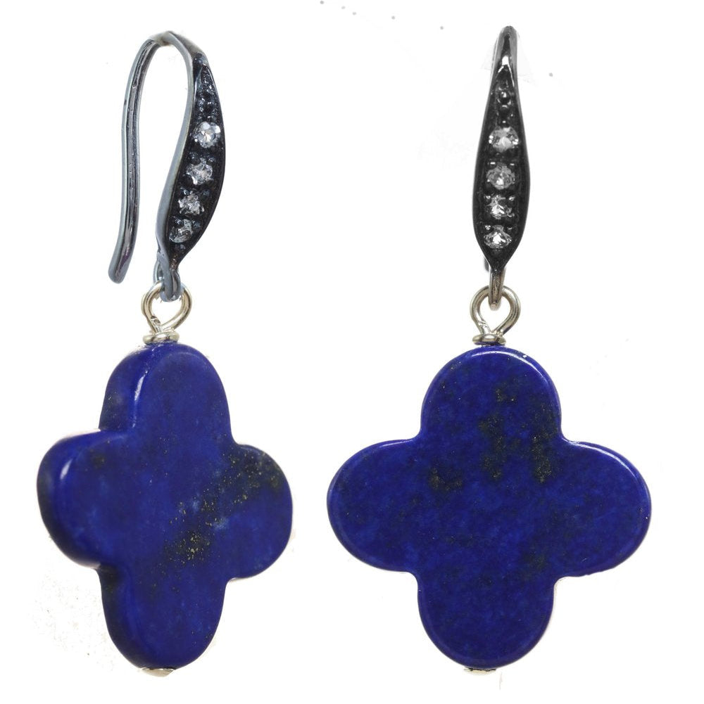 Pair of blue flower-shaped earrings with silver hooks on a white background