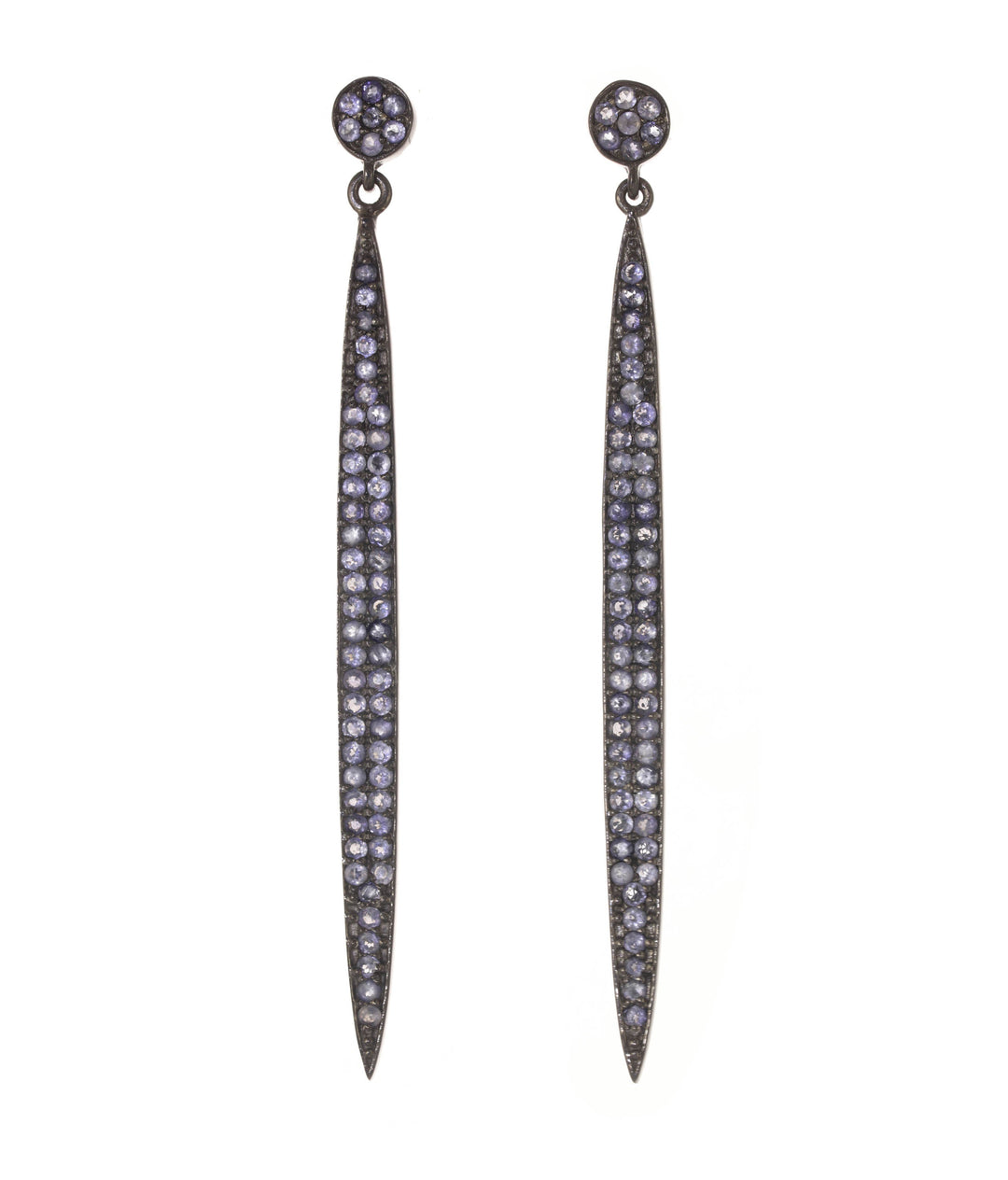 Pair of long, thin earrings with purple gemstones on a white background