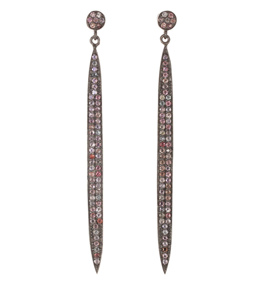 Pair of long, thin earrings with rhinestone embellishments on a white background