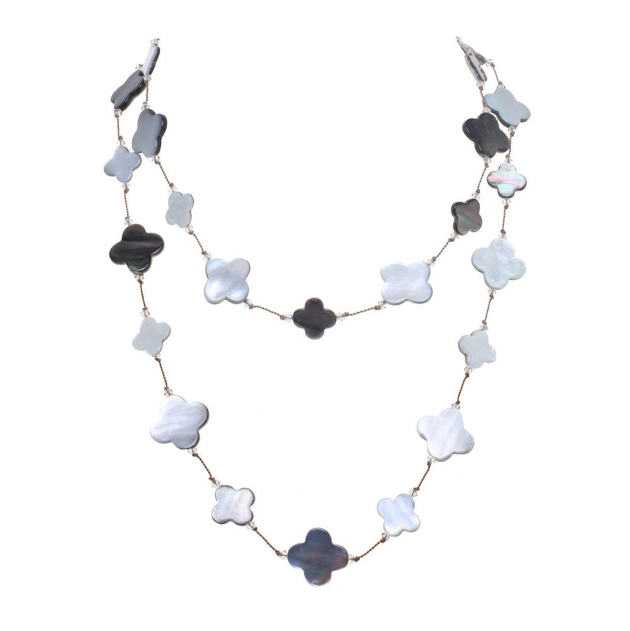 Necklace with clover-shaped beads on a white background