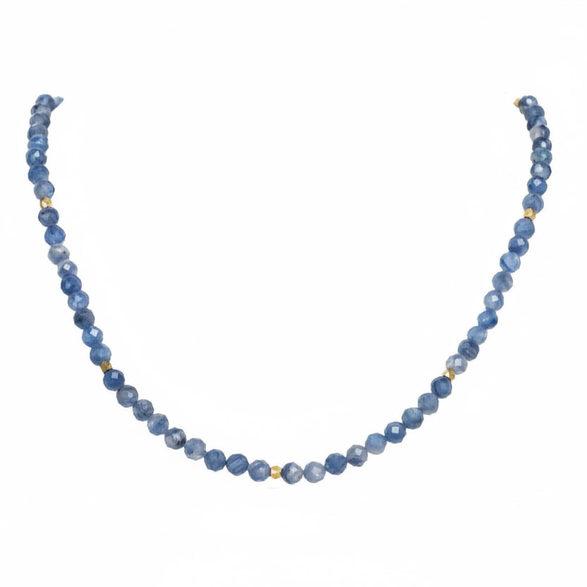 Blue beaded necklace on a white background