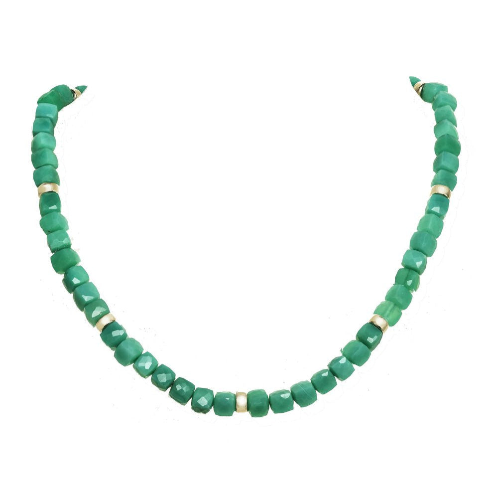 Green beaded necklace on a white background