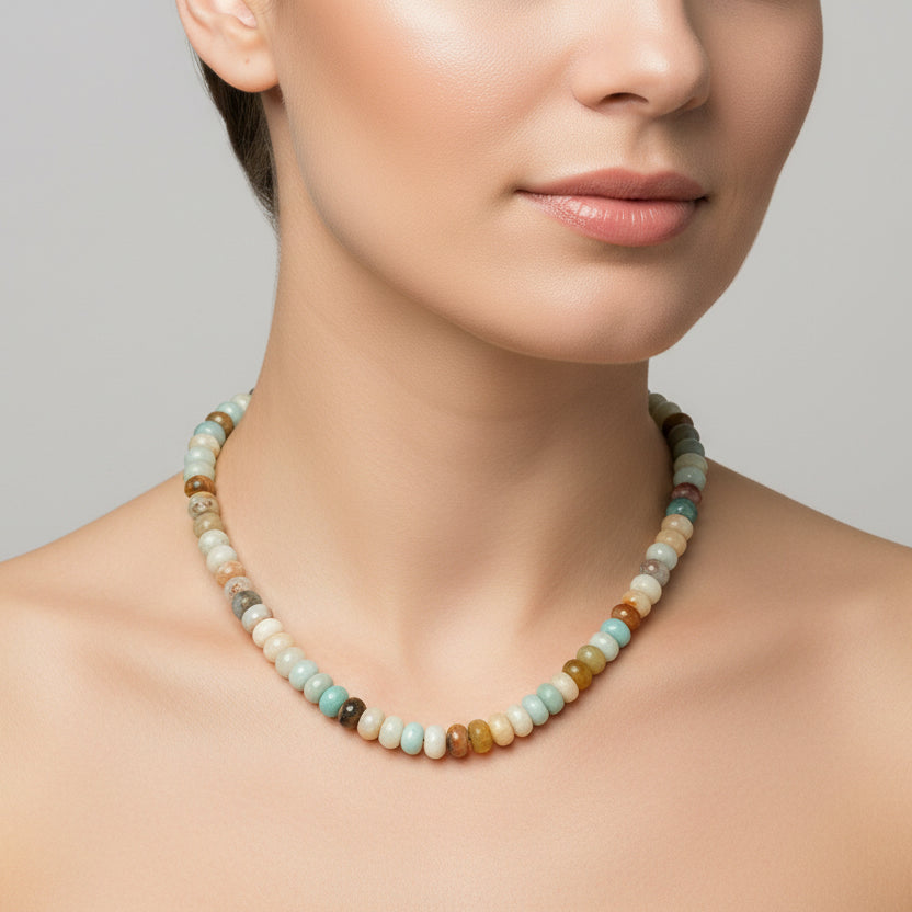 Necklace with multicolored beads on a white background