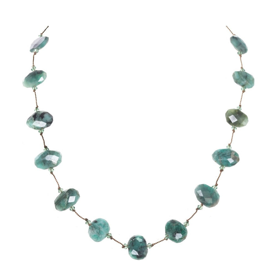 Necklace with green gemstones on a white background