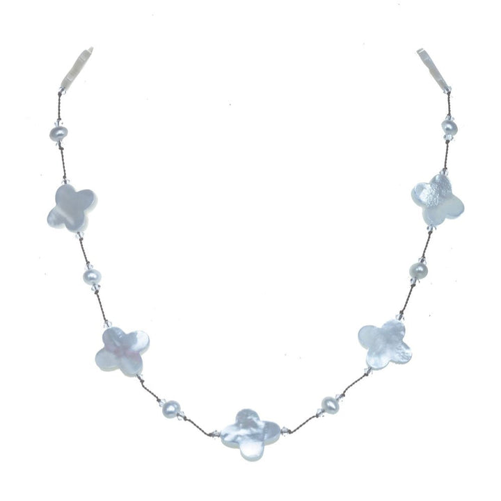 Necklace with floral and pearl designs on a white background