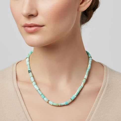 Necklace with turquoise beads on a white background