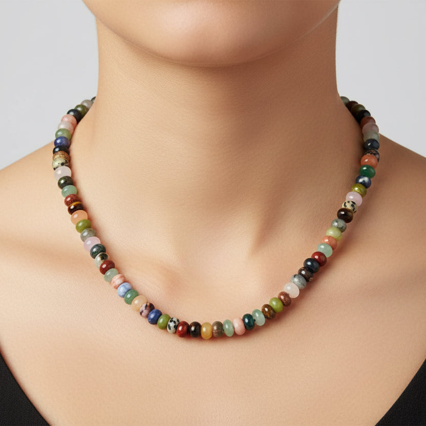 Necklace with multicolored beads on a white background