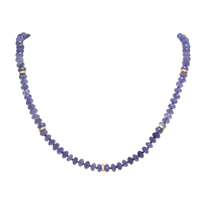 Necklace with purple beads on a white background