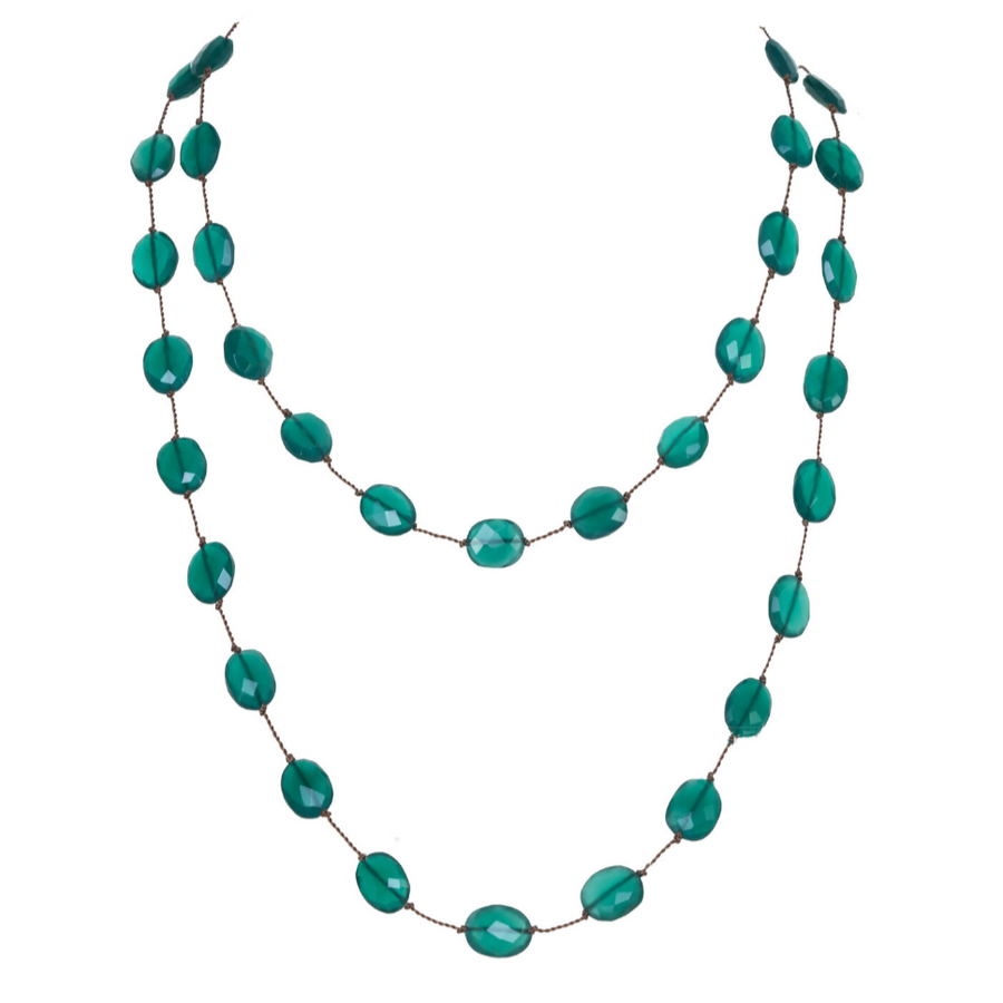 Turquoise beaded necklace on a white background